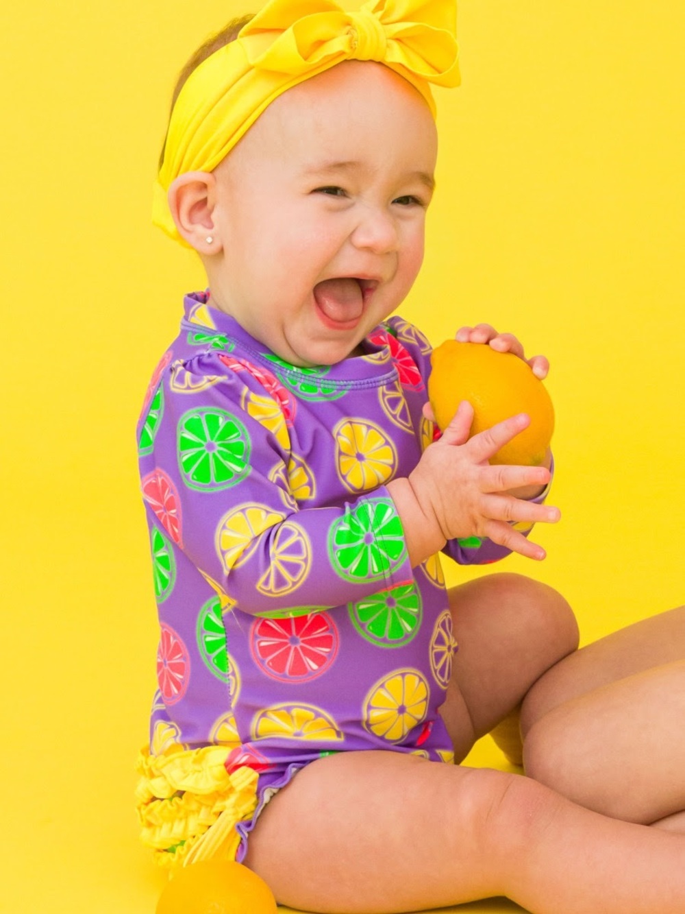 Ruffle butts 
Neon Long Sleeve One Piece Rash Guard